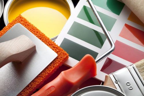 Paint color cards with decorating equipment